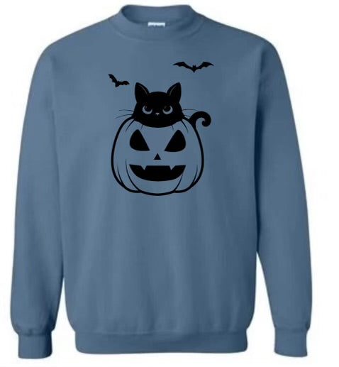 Cat in the pumpkin